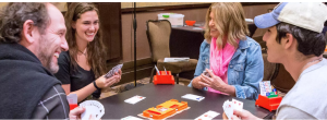 Family playing bridge Cropped.png